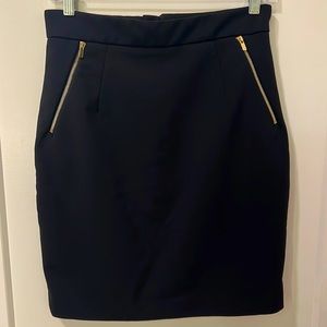 Mint Condition Pencil Skirt with gold zipper pockets and zip enclosure
